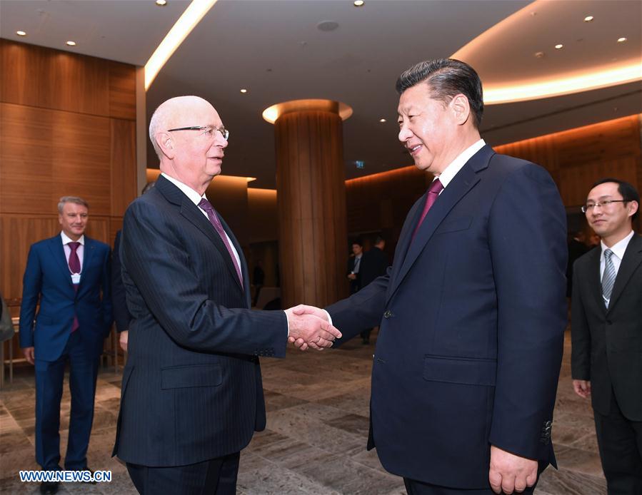 SWITZERLAND-DAVOS-CHINA-XI JINPING-SCHWAB-MEETING