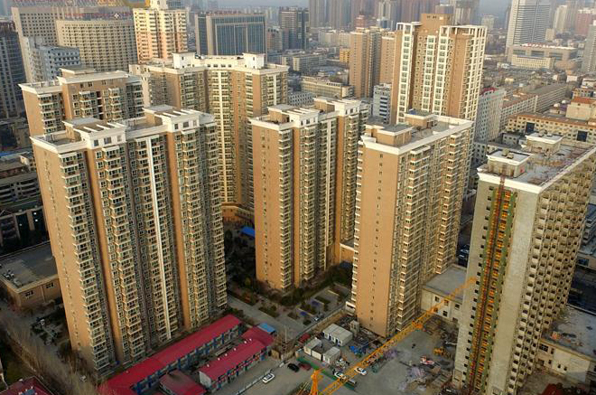 Economic Watch: China reins in galloping property market